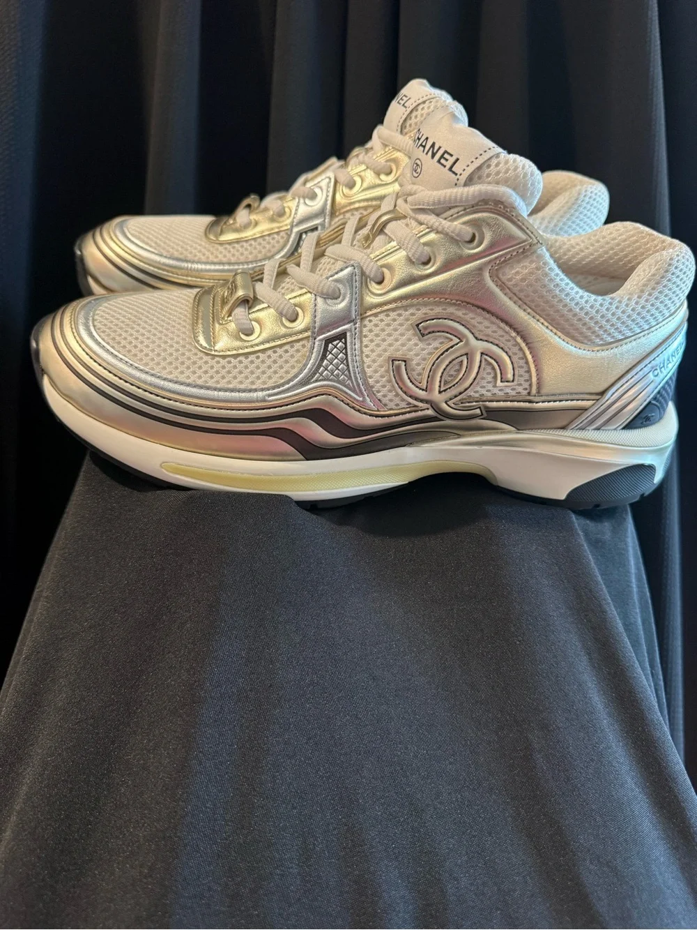 CHANEL Women’s White and Gold Metallic Lace-Up Sneakers
